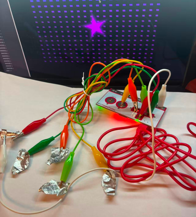 By using tin foil and MakeyMakey for circuit connection, the control and visual effects can interact.