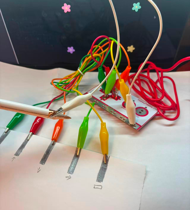 By using pencil strokes to connect the circuit with MakeyMakey, the control interacts with the visual effect.