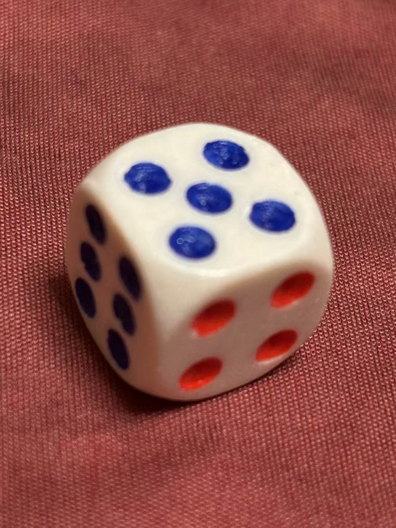 This is the top-right angle of the dice.